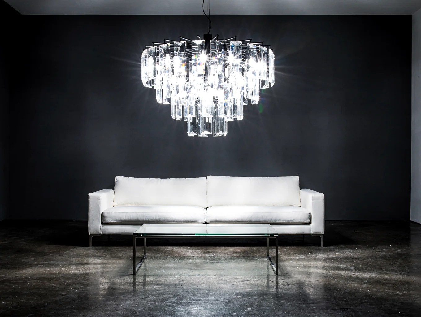 LUMEO sculptural chandelier illuminating a modern architectural interior
